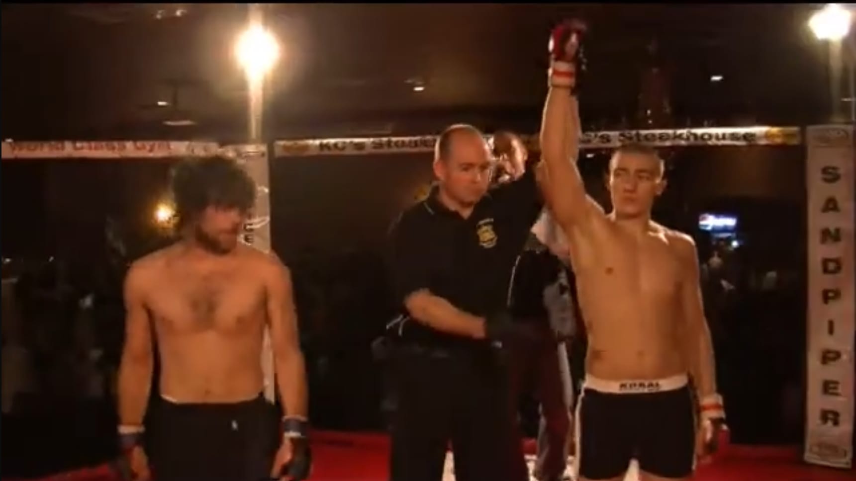 Coach Eric competing in his first professional MMA fight