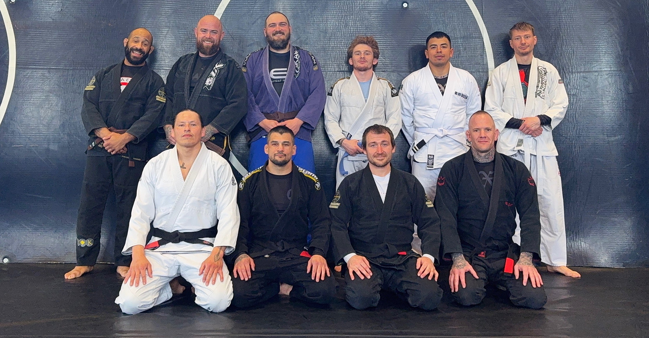 Zen Martial Arts members training Brazilian Jiu-Jitsu on the mats